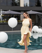 Sleeveless Smocked Floral Ruffled Wave Hem Dress