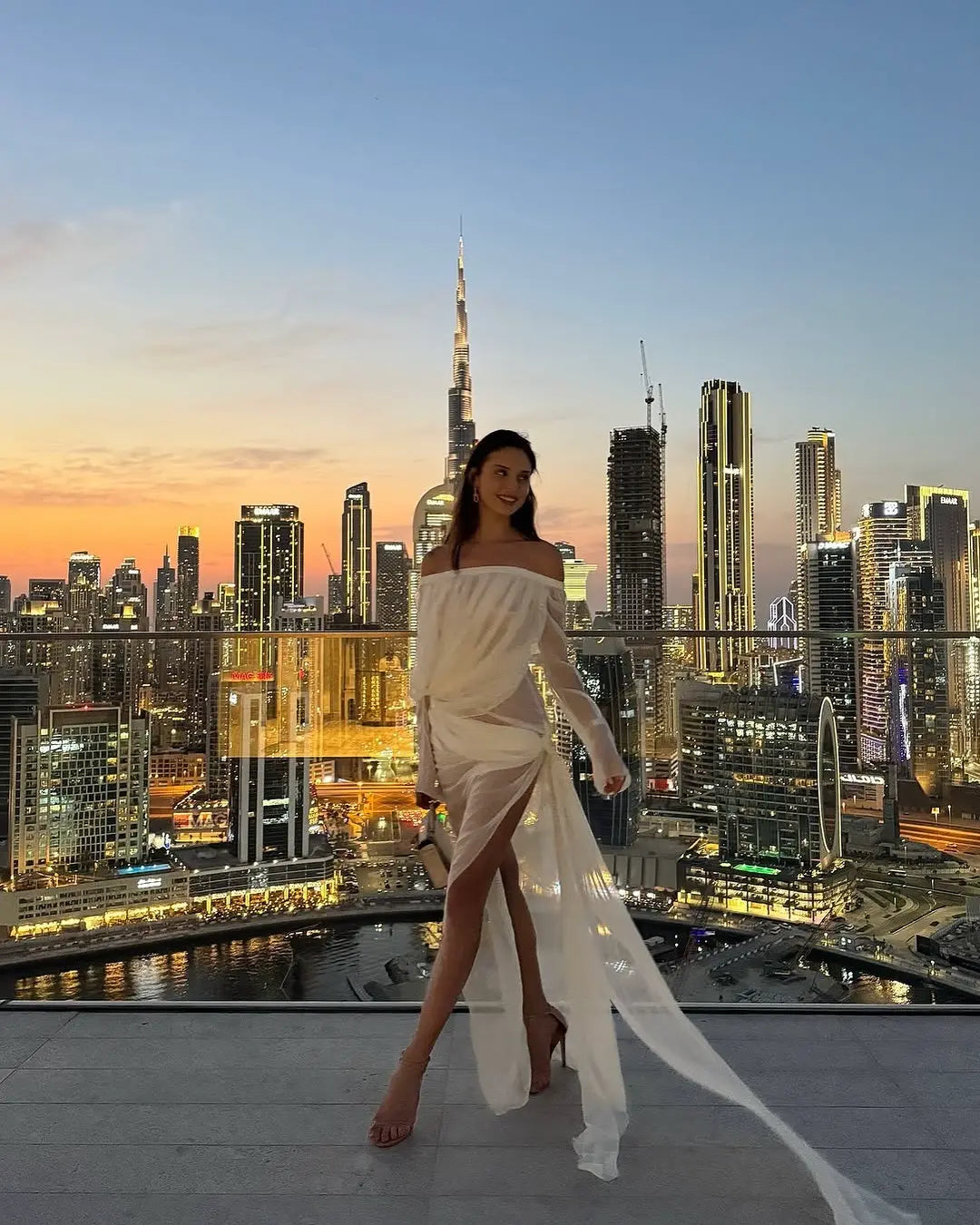 Off-shoulder draped sheer dress