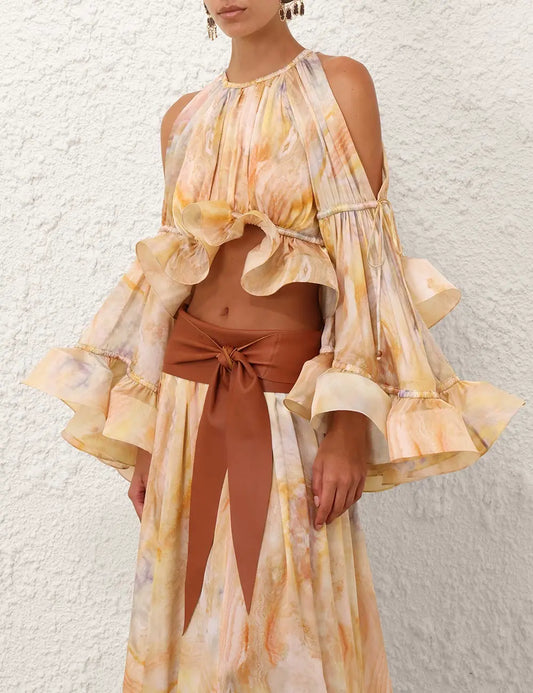 Shoulder cutout flounce sleeve top and ruffled hem skirt