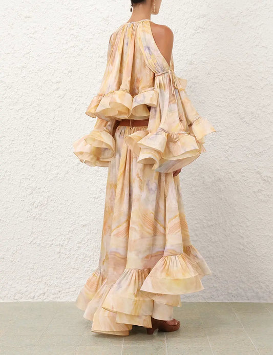 Shoulder cutout flounce sleeve top and ruffled hem skirt