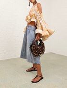 Shoulder cutout flounce sleeve top and ruffled hem skirt